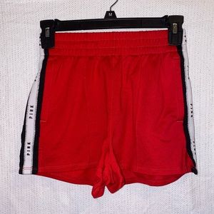 Red gym shorts VS Pink